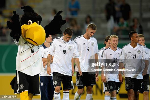 German mascot Paule celebrates with players after the Under 21 international friendly match between Germany U21 and Argentina U21 at...