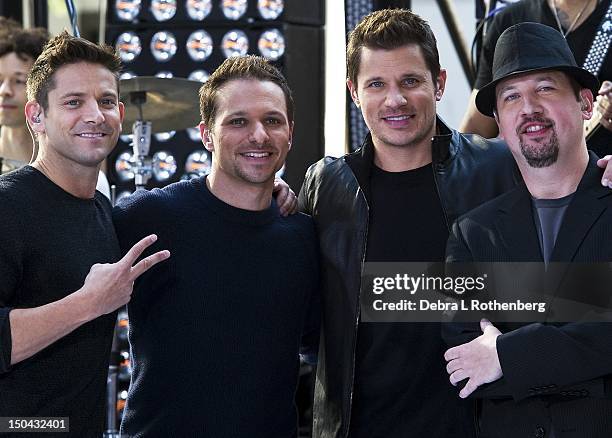 Jeff Timmons,Drew Lachey, Nick Lachey, and Justin Jeffre of 98 Degrees perform on NBC's "Today" at Rockefeller Plaza on August 17, 2012 in New York...