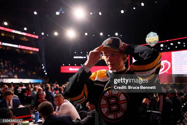 Beckett Hendrickson celebrates after being selected 124th overall pick by the Boston Bruins during the 2023 Upper Deck NHL Draft at Bridgestone Arena...