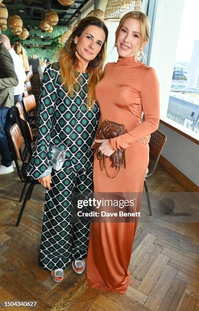 Founder of GCFAs and Eco-Age Creative Director Livia Firth and Ellie Goulding attend the GCFA 'Sharing The Table' dinner at Treehouse Hotel London on...