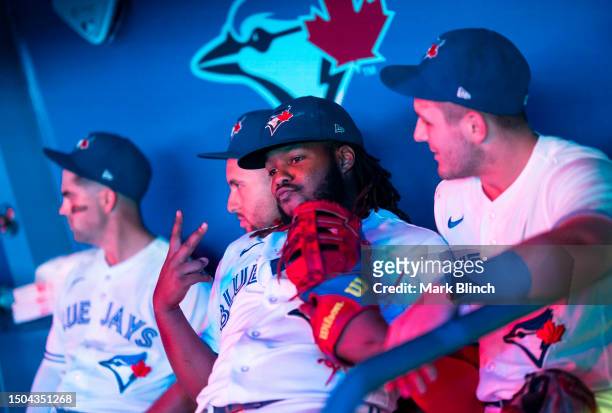 Vladimir Guerrero Jr. #27 of Toronto Blue Jays looks on in the dugout before playing the San Francisco Giants in their MLB game at the Rogers Centre...