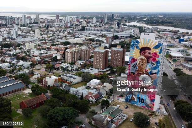 Aerial view of a giant mural by artist Cobre depicting Argentina football player Lionel Messi with the World Cup Trophy on June 29, 2023 in Santa Fe,...