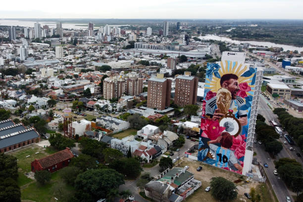 Aerial view of a giant mural by artist Cobre depicting Argentina football player Lionel Messi with the World Cup Trophy on June 29, 2023 in Santa Fe,...