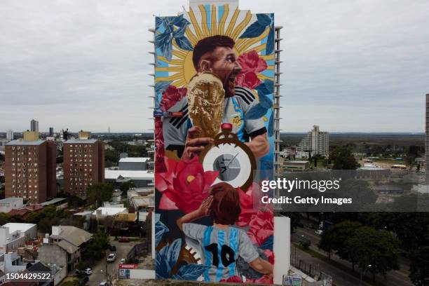 Aerial view of a giant mural by artist Cobre depicting Argentina football player Lionel Messi with the World Cup Trophy on June 29, 2023 in Santa Fe,...