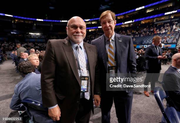 General manager Barry Trotz and David Poile of the Nashville Predators look on during the 2023 Upper Deck NHL Draft - Rounds 2-7 at Bridgestone Arena...