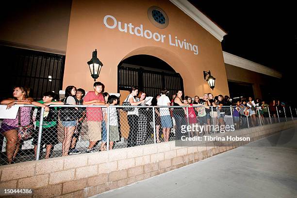 Fans attends Lionsgate's 'The Hunger Games' blu-ray disc and DVD release and fan signing at Walmart on August 17, 2012 in Santa Clarita, California.