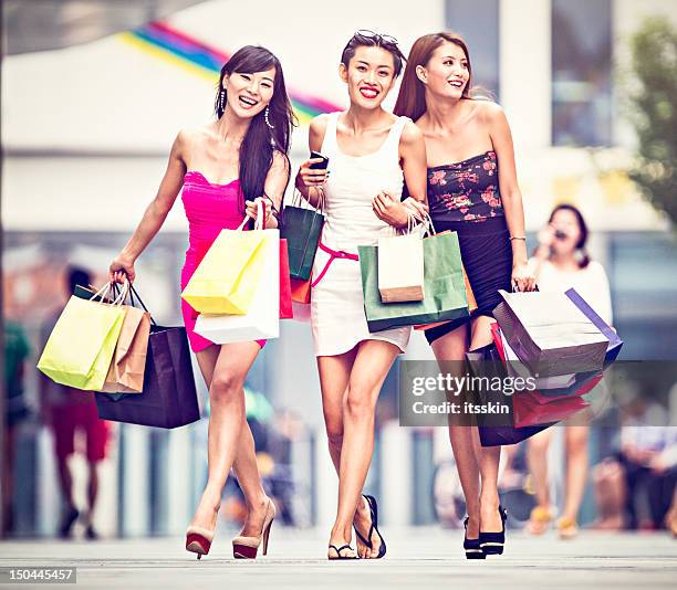 three asian girls shopping - glamour asian stock pictures, royalty-free photos & images