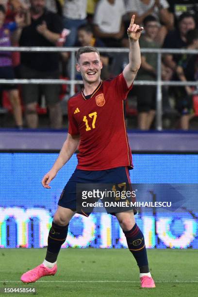 Spain's defender Sergio Gomez celebrates scoring the 5-1 goal during the UEFA European Under-21 Championship semi-final football match Spain vs...