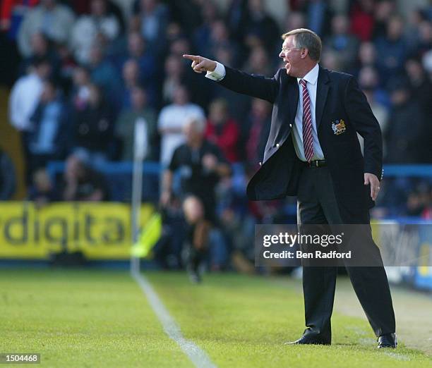Manchester United manager Sir Alex Ferguson shouts orders to his players during the FA Barclaycard Premiership match between Fulham and Manchester...