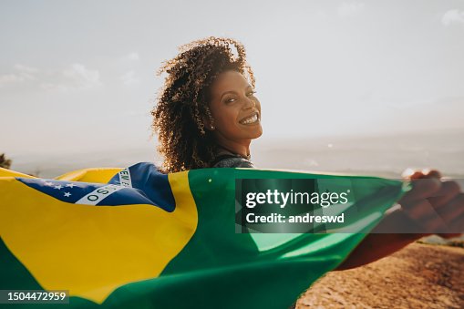 Smiling woman with the flag of Brazil Smiling woman with the flag of Brazil