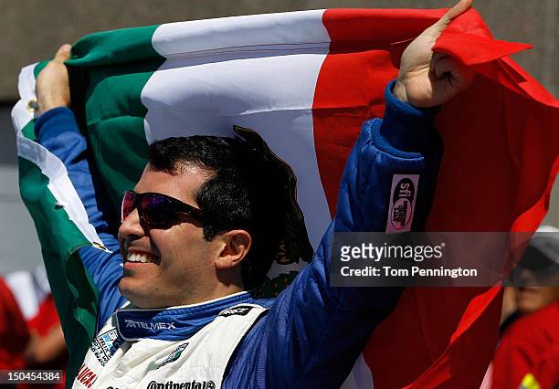 Memo Rojas, driver of the TELMEX Ganassi BMW Riley, celebrates after winning the Grand-Am Rolex Sports Car Series MONTREAL 200 at Circuit Gilles...