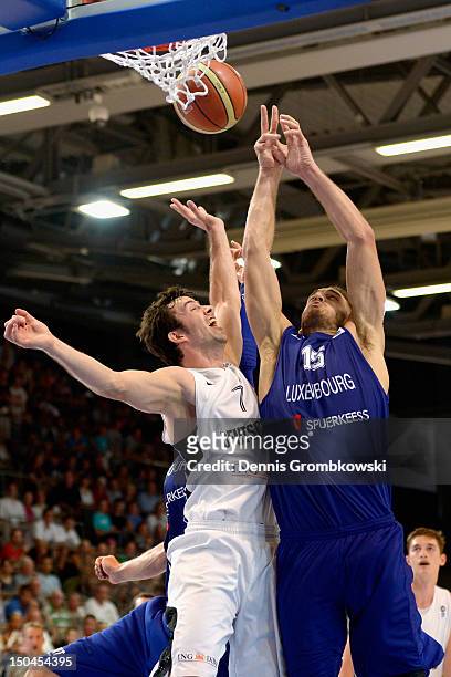 Philip Zwiener of Germany and Jean Kox of Luxembourg battle for the ball during the EuroBasket 2013 Qualifier match between Germany and Luxembourg at...