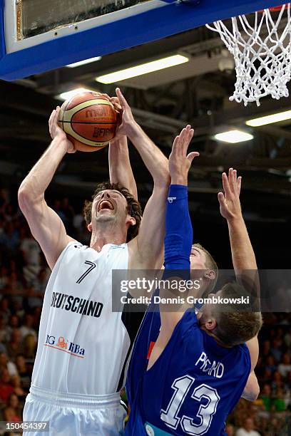 Philip Zwiener of Germany and Samy Picard of Luxembourg battle for the ball during the EuroBasket 2013 Qualifier match between Germany and Luxembourg...