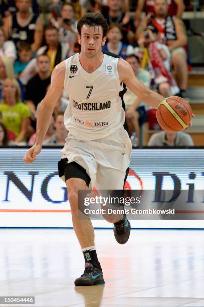 Philip Zwiener of Germany controls the ball during the EuroBasket 2013 Qualifier match between Germany and Luxembourg at Enervie Arena on August 18,...