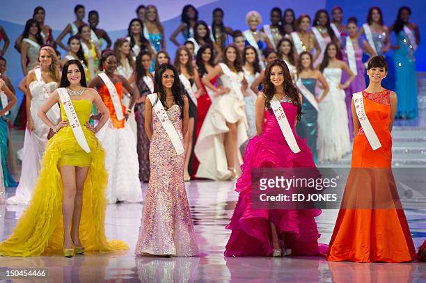 Miss Thailand Vanessa Phuang, Miss Fiji Koini Vakaloloma, Miss Guam Jeneva Bosko and Miss Guatemala Monique Aparicio Lopez pose during the Miss World...