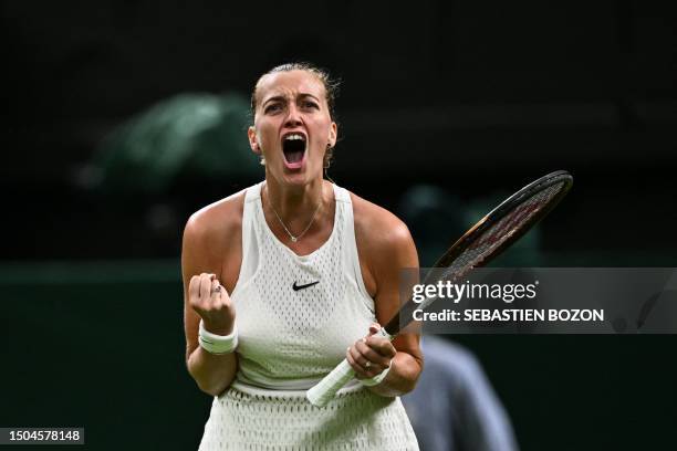 Czech Republic's Petra Kvitova celebrates after winning against Italy's Jasmine Paolini in their women's singles tennis match on the third day of the...