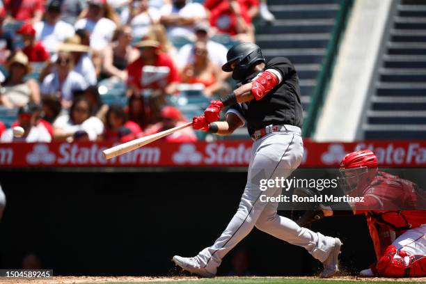 Eloy Jimenez of the Chicago White Sox hits a two-run single against the Los Angeles Angels in the third inning at Angel Stadium of Anaheim on June...