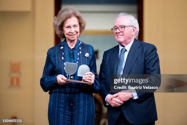 Queen Sofia receives the "Valor Añadido" Award as Eduardo Serra Rexach looks on at Palacio del Marqués de Salamanca on June 29, 2023 in Madrid, Spain.