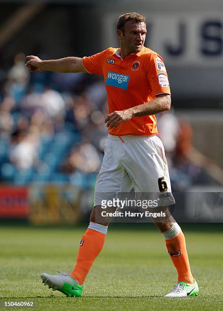 Ian Evatt of Blackpool in action during the npower Championship match between Millwall and Blackpool at The Den on August 18, 2012 in London, England.