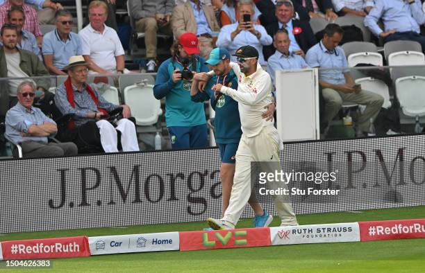 Australia bowler Nathan Lyon leaves the field with an injury during Day Two of the LV= Insurance Ashes 2nd Test match between England and Australia...