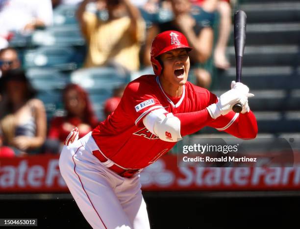 Shohei Ohtani of the Los Angeles Angels backs from a foul ball against the Chicago White Sox in the seventh inning at Angel Stadium of Anaheim on...