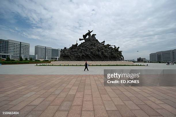 Photo taken on August 18, 2012 shows a statue of Genghis Khan in Genghis Khan Plaza, in the inner Mongolian city of Ordos. Miss China won the coveted...