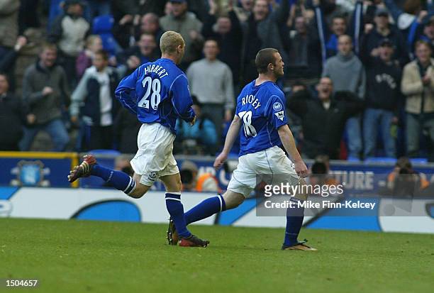 Wayne Rooney of Everton celebrates scoring during the FA Barclaycard Premiership match between Everton and Arsenal at Goodison Park in Liverpool on...