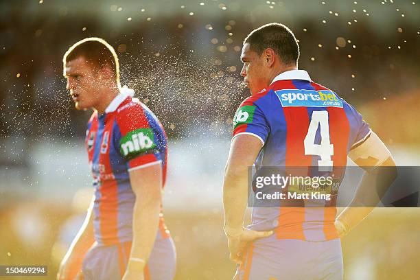 Timana Tahu of the Knights takes a break during the round 24 NRL match between the Manly Warringah Sea Eagles and the Newcastle Knights at Brookvale...