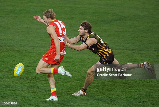 Piers Flanagan of the Suns kicks the ball during the round 21 AFL match between the Hawthorn Hawks and the Gold Coast Suns at the Melbourne Cricket...