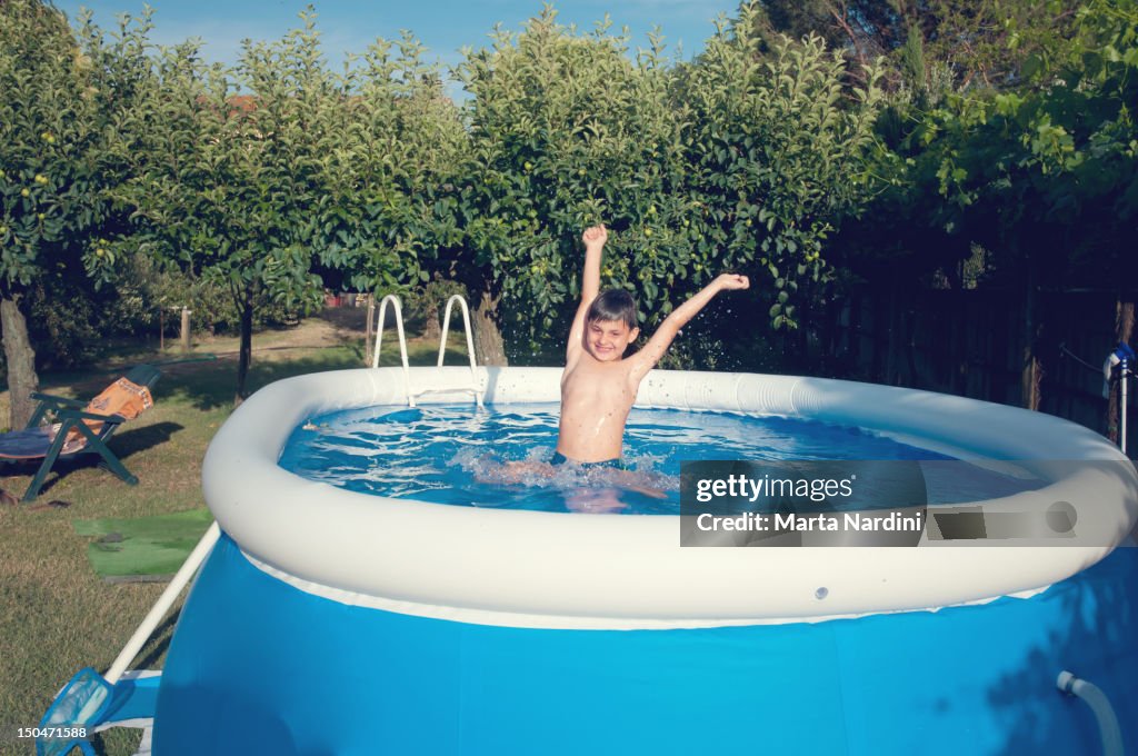 Boy in swimming pool