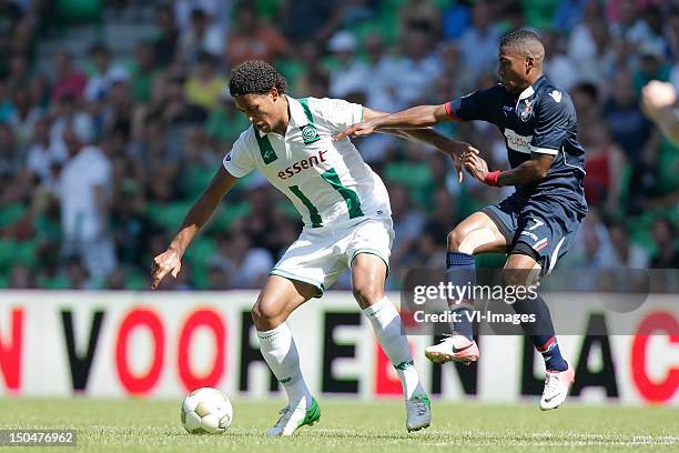 Genaro Snijders of Willem II Virgil van Dijk of FC Groningen during the Dutch Eredivisie match between FC Groningen andWillem II at the Euroborg...