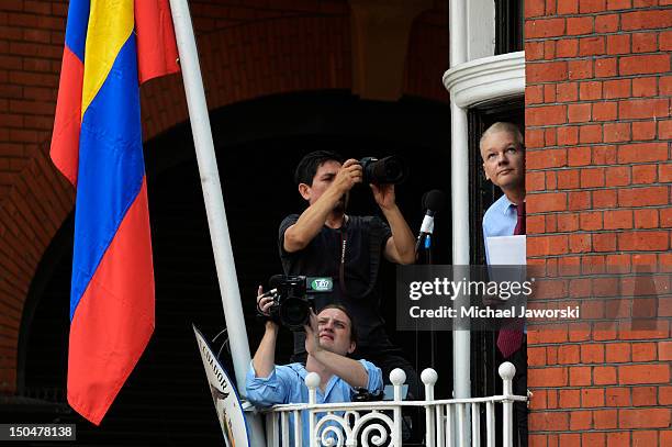 Julian Assange speaks on the balcony of the Ecuadorean embassy on August 19, 2012 in London, England.