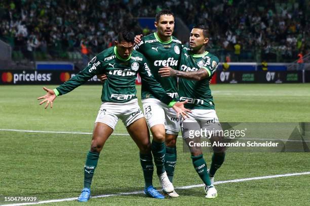 Rony of Palmeiras celebrates with his team mates after scoring the first goal of their team during a match between Palmeiras and Bolivar as part of...