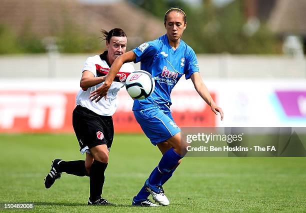 Rachel Unitt of Birmingham holds off the challenge of Remi Allen of Lincoln during the FA WSL Cup match between Birmingham City Ladies and Lincoln...