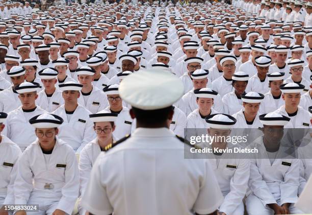 Incoming plebes take part in their Oath of Office Ceremony during Induction Day at the U.S. Naval Academy on June 29, 2023 in Annapolis, Maryland....