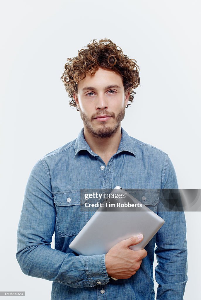 Man holding digital tablet.