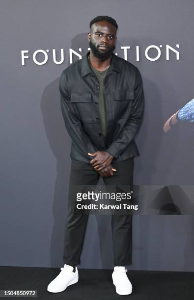 Michael Akinsulire arrives at the "Foundation" Season 2 Global Premiere at Regent Street Cinema on June 29, 2023 in London, England.