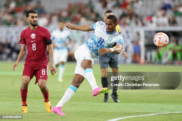 Jerry Bengtson of Honduras attempts a shot ahead of Ali Assadalla of Qatar during the second half of the Concacaf Gold Cup Group B match at State...