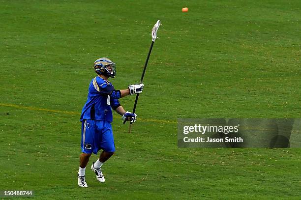 Billy Bitter of the Charlotte Hounds advances the ball during Major League Lacrosse action against the Rochester Rattlers at American Legion Memorial...