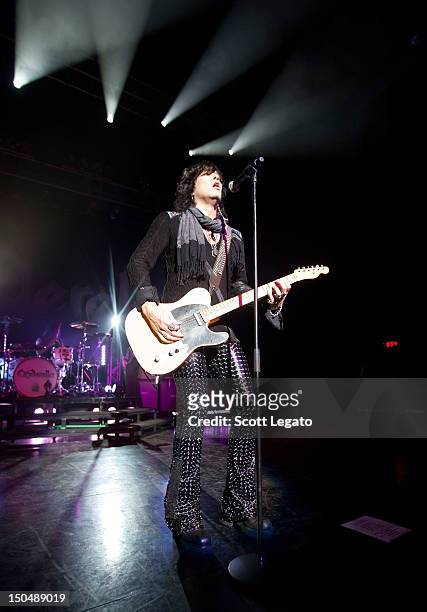 Tom Keifer of Cinderella performs at DTE Energy Music Theater on August 18, 2012 in Clarkston, Michigan.