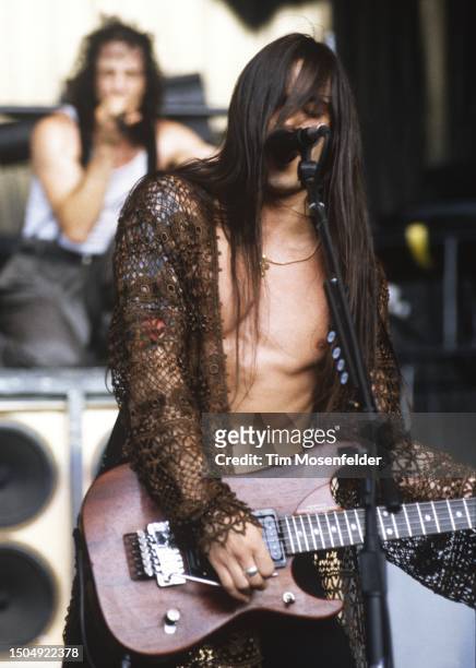 Gary Cherone and Nuno Bettencourt of Extreme perform at Shoreline Amphitheatre on June 28, 1993 in Mountain View, California.