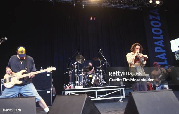 Tim Commerford, Brad Wilk, Zach De La Rocha, and Tom Morello of Rage Against the Machine perform during Lollapalooza at Shoreline Amphitheatre on...