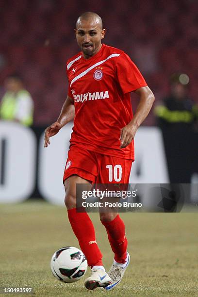 Rafik Zoheir Djebbour of Olympiacos in action during the pre-season friendly match between SSC Napoli and Olympiacos at Stadio San Paolo on August...