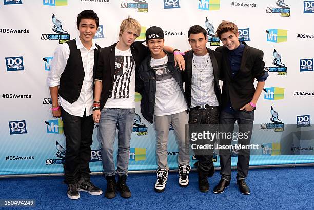 Will Jay, Dalton Rapattoni, Dana Vaughns, Gabriel Morales and Cole Pendery of the band IM5 arrive at the 2012 Do Something Awards at Barker Hangar on...