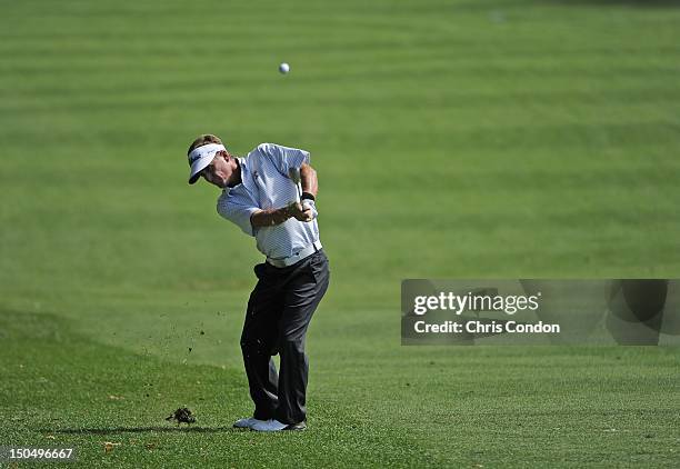 Willie Wood hits his approach to the eighth hole during the final round of the Dick’s Sporting Goods Open at En-Joie Golf Course on August 19, 2012...