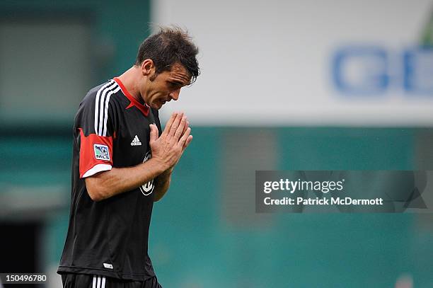 Emiliano Dudar of DC United walks off the field after being ejected in the second half against the Philadelphia Union at RFK Stadium on August 19,...