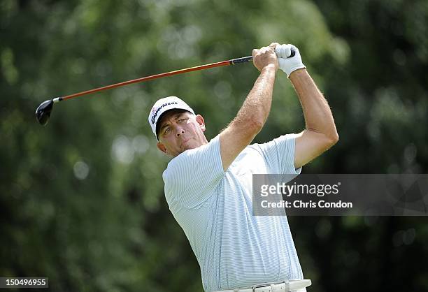 Tom Lehman tees off on the second hole during the final round of the Dick’s Sporting Goods Open at En-Joie Golf Course on August 19, 2012 in...