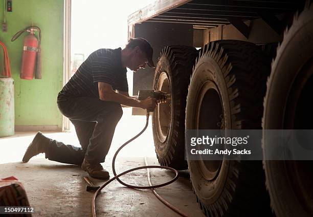 a farmer prepares a truck for harvest work - truck repair stock pictures, royalty-free photos & images