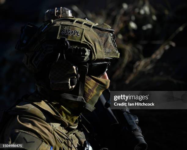 An Australian soldier from 6 RAR takes part in an urban assault on June 30, 2023 in Townsville, Australia. The exercise was held as part of a broader...