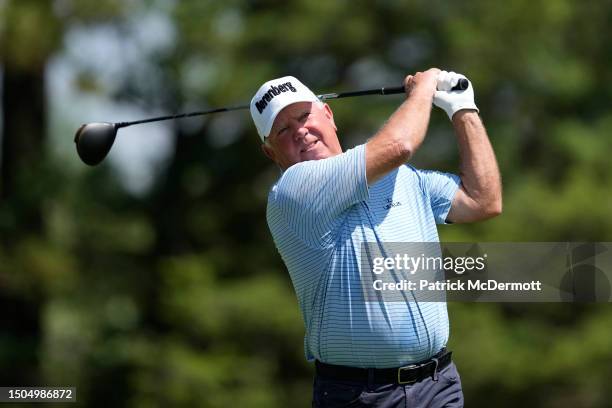 Mark O'Meara of the United States plays his tee shot on the 14th hole during the first round of the U.S. Senior Open Championship at SentryWorld on...